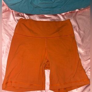 Aritzia TNA butter shorts biker shots orange L